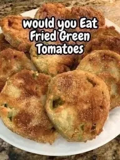 Crispy Fried Green Tomatoes served on a plate with dipping sauce