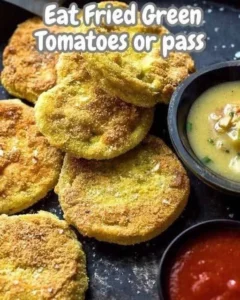 Plate of crispy fried green tomatoes served with dipping sauce