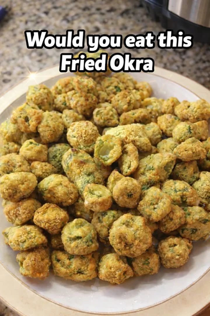 Crispy fried okra served on a plate with dipping sauce