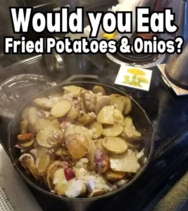 Golden fried potatoes and onions served in a skillet