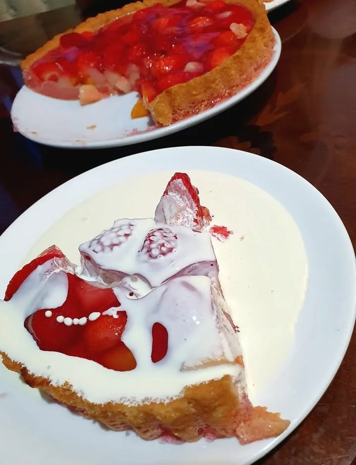 Delicious homemade Fruit Flan topped with assorted fresh fruits