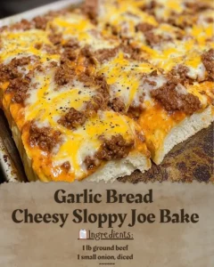 Garlic Bread Cheesy Sloppy Joe Bake topped with melted cheese and garlic bread crust