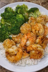 Garlic Butter Shrimp and Scallops served with Broccoli and Rice