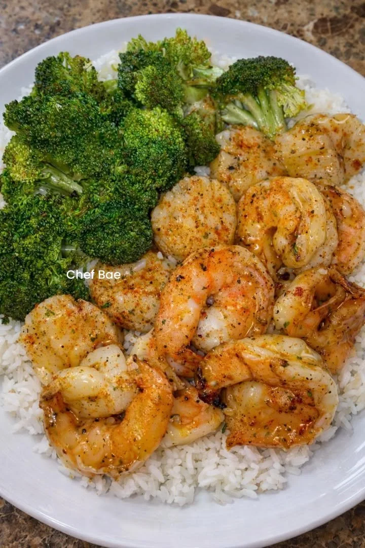 Garlic Butter Shrimp and Scallops served with Broccoli and Rice