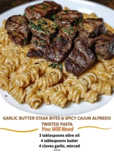 Delicious Garlic Butter Steak Bites served with Spicy Cajun Alfredo Twisted Pasta