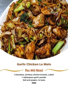 A delicious plate of Garlic Chicken Lo Mein with vegetables and garlic sauce.