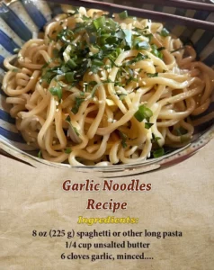 Plate of delicious garlic noodles with herbs and garlic garnish