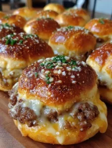 Garlic Parmesan Cheeseburger Bombs served on a plate with garnish.