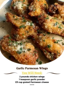 Delicious Garlic Parmesan Wings served with a side of dipping sauce.
