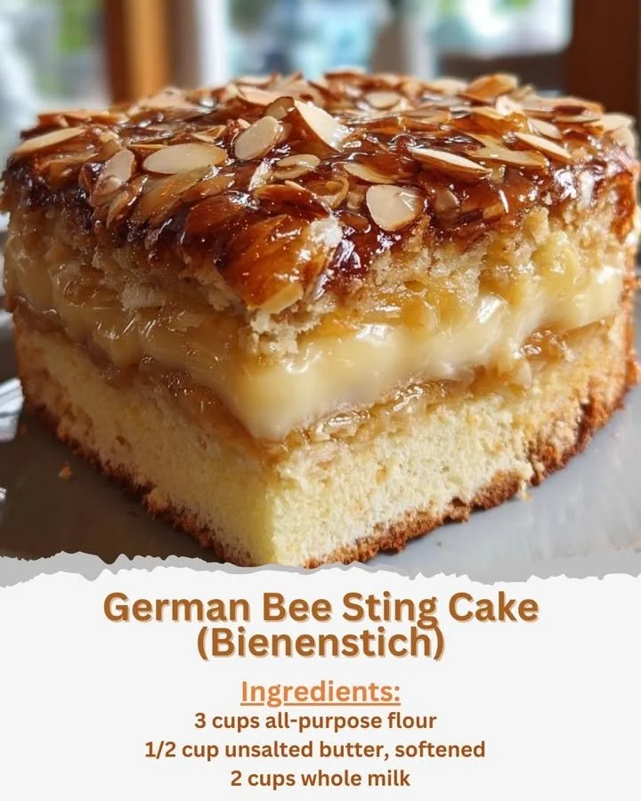 Delicious slice of German Bee Sting Cake topped with honey and almonds