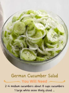 A delicious bowl of German cucumber salad with dressing and herbs
