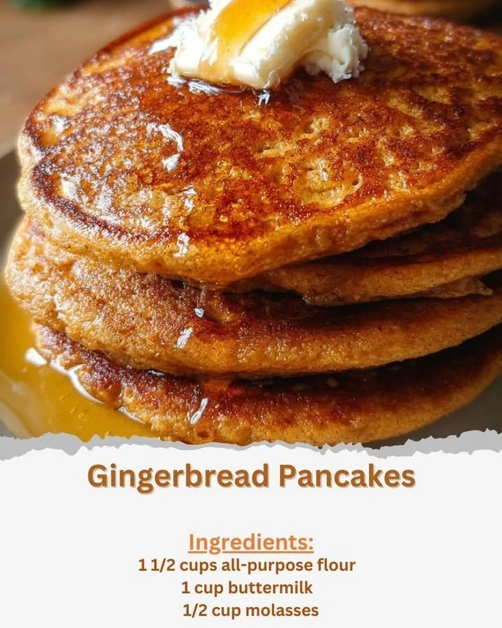 Fluffy gingerbread pancakes topped with maple syrup and whipped cream