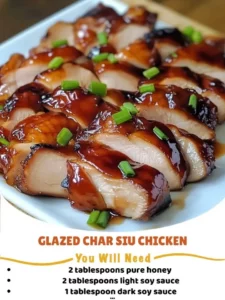 Deliciously glazed Char Siu Chicken served on a plate.