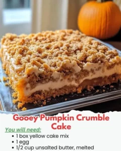 Deliciously gooey pumpkin crumble cake with a crunchy topping