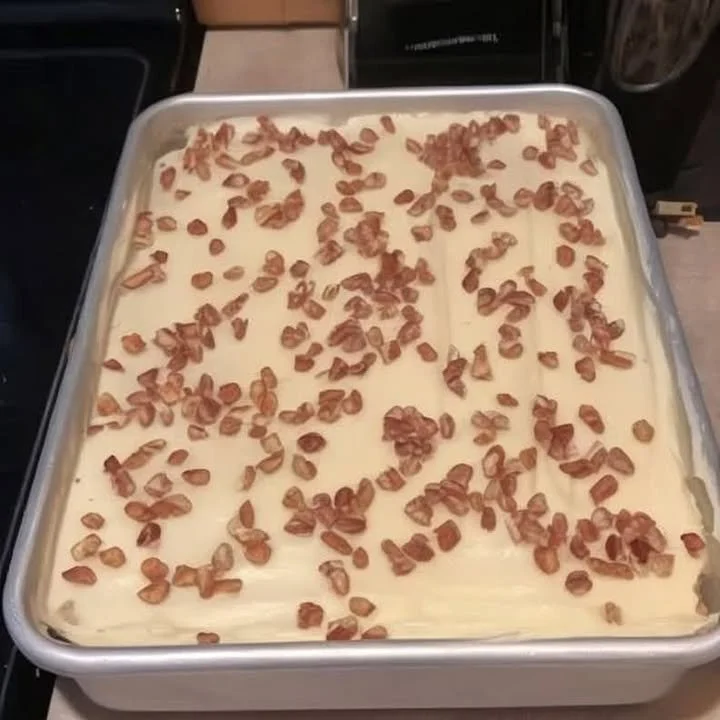 Bowl of Grandma's famous apple crisp dessert with warm apples and crunchy topping