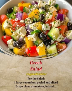 A colorful Greek Salad with tomatoes, cucumbers, olives, and feta cheese.