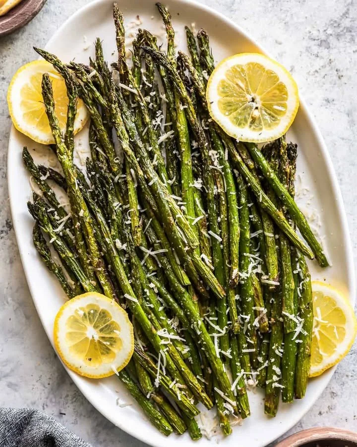 Delicious grilled asparagus garnished and ready to serve
