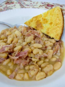 A delicious bowl of Ham & White Beans, showcasing a warm, hearty meal.
