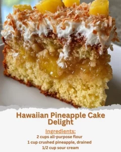Delicious Hawaiian Pineapple Cake topped with tropical fruits and whipped cream