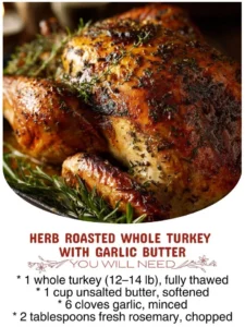 Herb Roasted Whole Turkey topped with garlic butter, ready for the holiday table.
