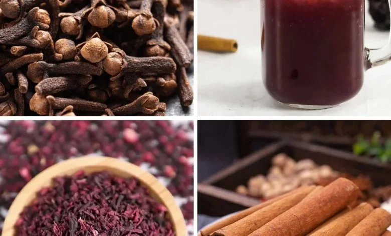 Hibiscus and Black Lime Tea in a glass mug with fresh lime slices