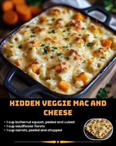 Bowl of Hidden Veggie Mac and Cheese topped with fresh herbs and veggies