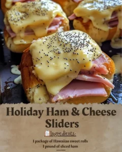 Delicious holiday ham and cheese sliders on a festive platter