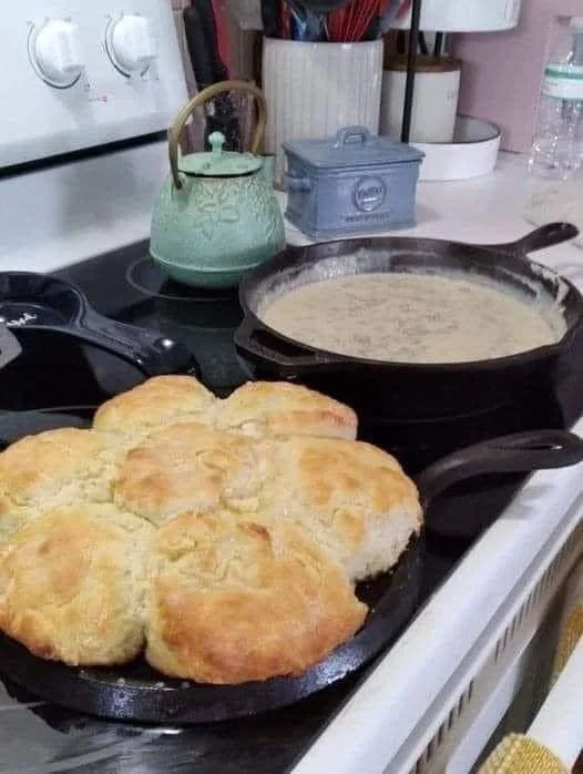 Freshly baked homemade buttermilk biscuits on a cooling rack