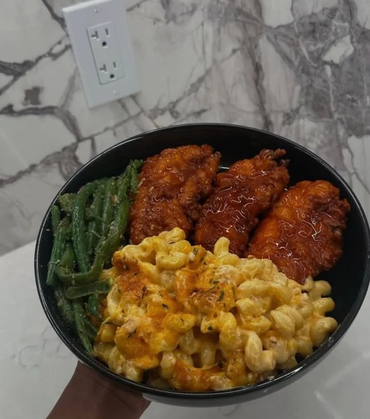 Delicious homemade hot honey chicken tenders served with dipping sauce.