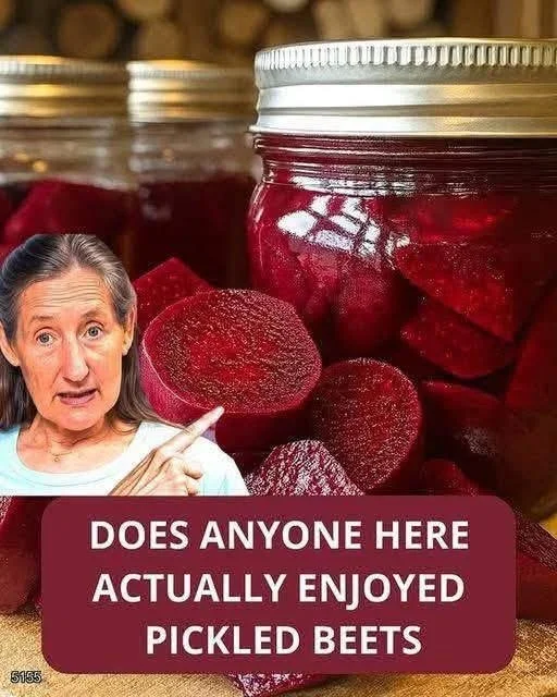 Jars of homemade pickled beets on a kitchen counter