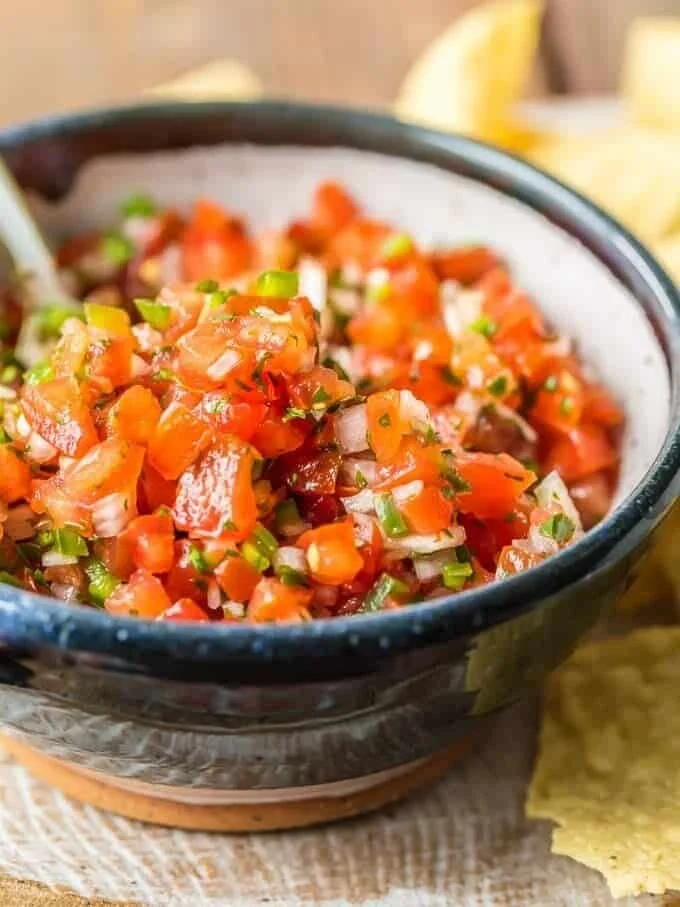 Bowl of fresh homemade Pico de Gallo with tomatoes, onions, and cilantro