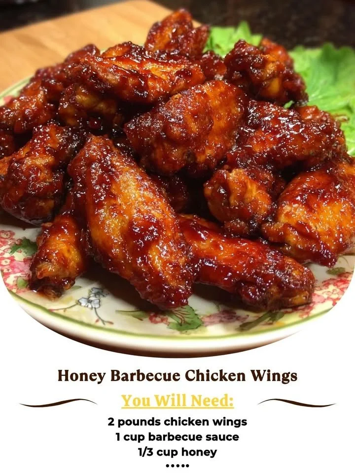 Delicious honey barbecue chicken wings garnished and ready to serve.