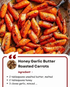 Honey garlic butter roasted carrots served on a plate.