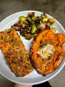 Honey garlic glazed salmon served with balsamic Brussels sprouts and sweet potato
