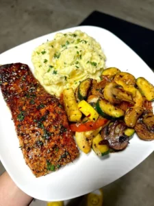 Honey Garlic Salmon served with Garlic Butter Yukon Gold Mashed Potatoes and vegetables