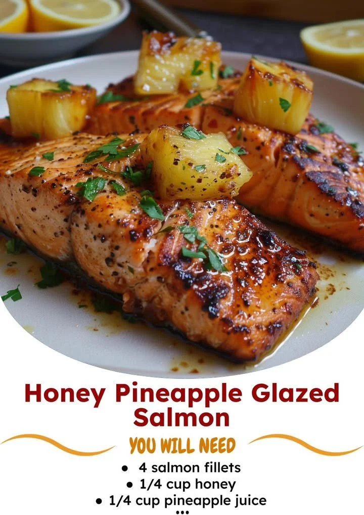 Honey Pineapple Glazed Salmon on a plate garnished with herbs