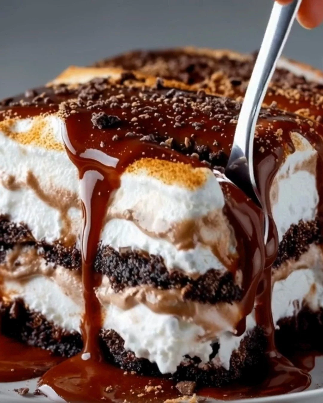 Delicious hot chocolate lasagna with layers of chocolate and marshmallows