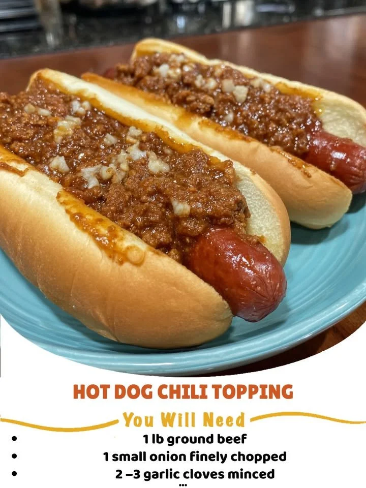 A delicious serving of hot dog chili topping on grilled hot dogs