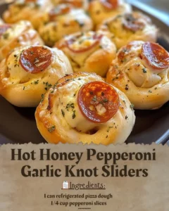 Hot honey pepperoni garlic knot sliders on a platter