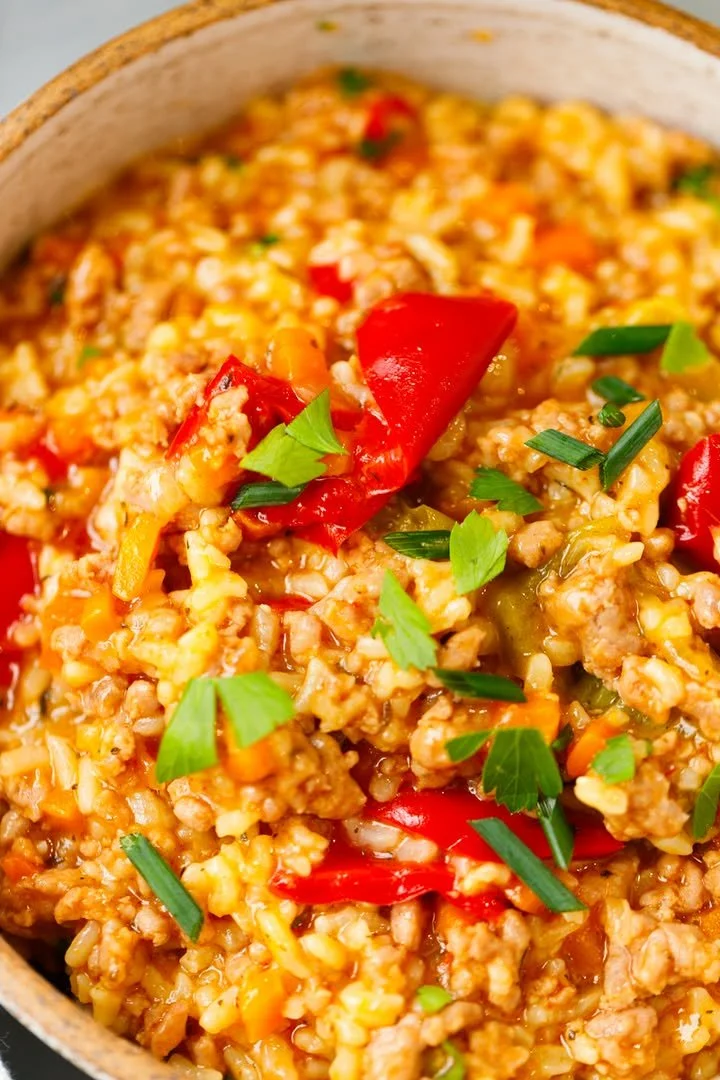 Instant Pot unstuffed peppers served in a bowl with fresh herbs