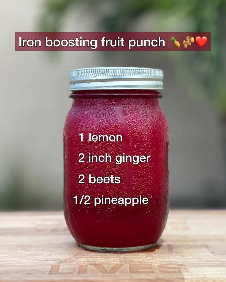 Glass of Iron Boosting Fruit Punch filled with fruits and vibrant colors.