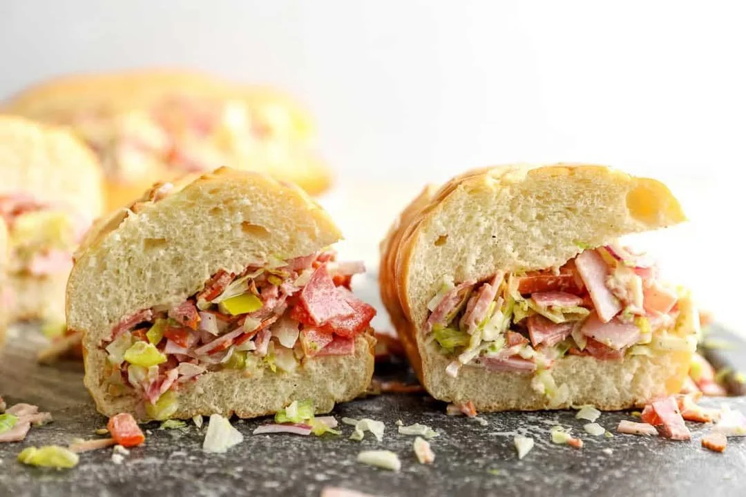 Delicious Italian Chopped Sandwich loaded with meats and fresh vegetables.