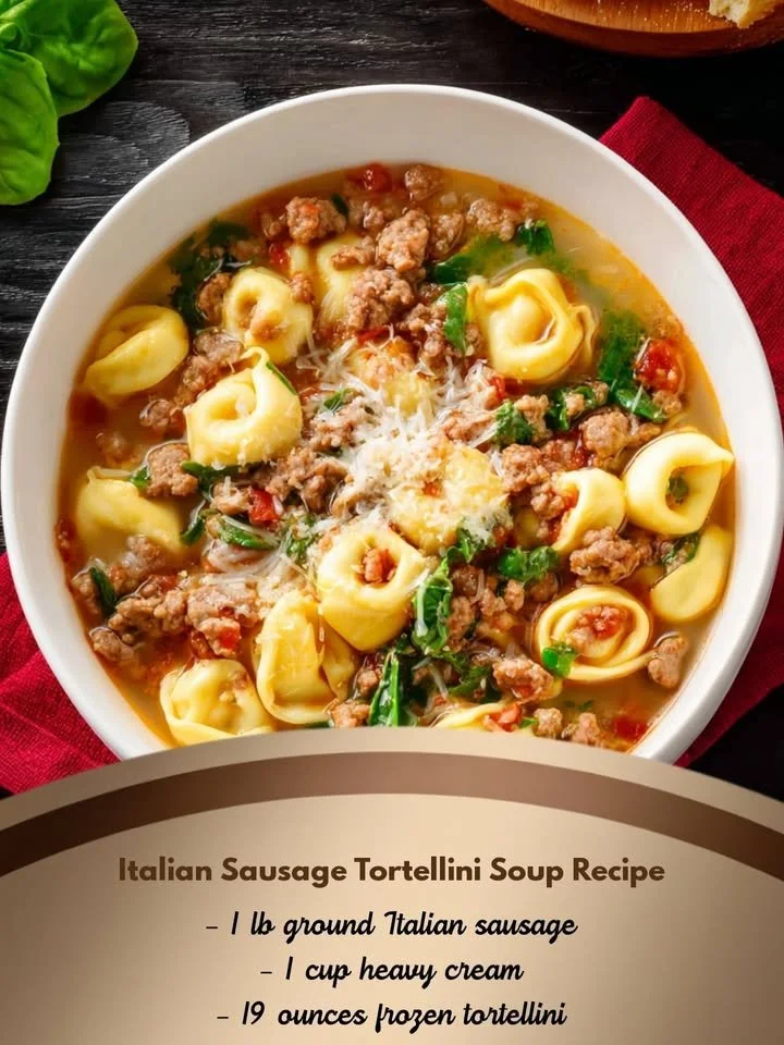 Bowl of Italian Sausage Tortellini Soup garnished with herbs