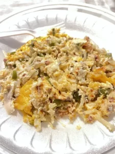 Delicious Jalapeño Popper Casserole topped with cheese and jalapeños