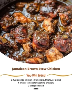 Delicious Jamaican Brown Stew Chicken served with rice and vegetables.