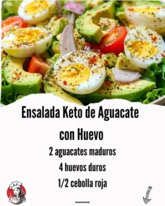 Keto Avocado Salad with Egg on a plate garnished with herbs