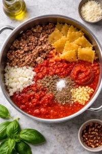 Bowl of delicious lasagna soup topped with cheese and fresh herbs