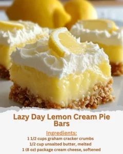 Delicious Lazy Day Lemon Cream Pie Bars on a plate with fresh lemon slices