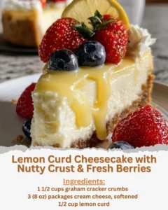 Lemon curd cheesecake with nutty crust and fresh berries on a white plate