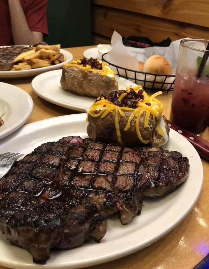 Delicious steak meal at Texas Roadhouse with vibrant decor